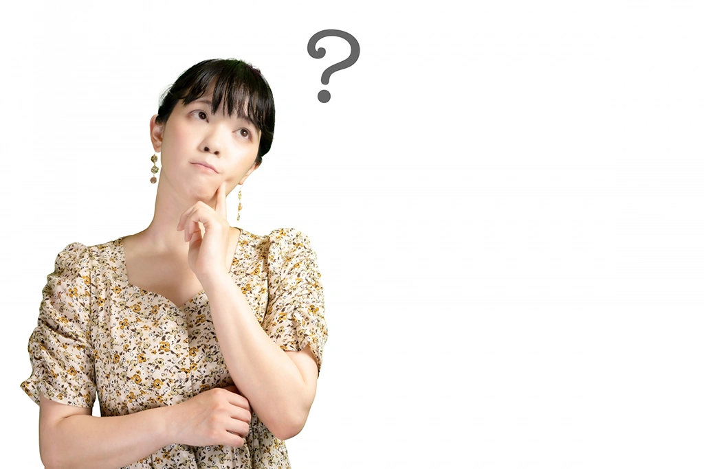 疑問に思う女性